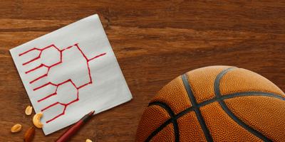 Brackets on a napkin with basketball in foreground